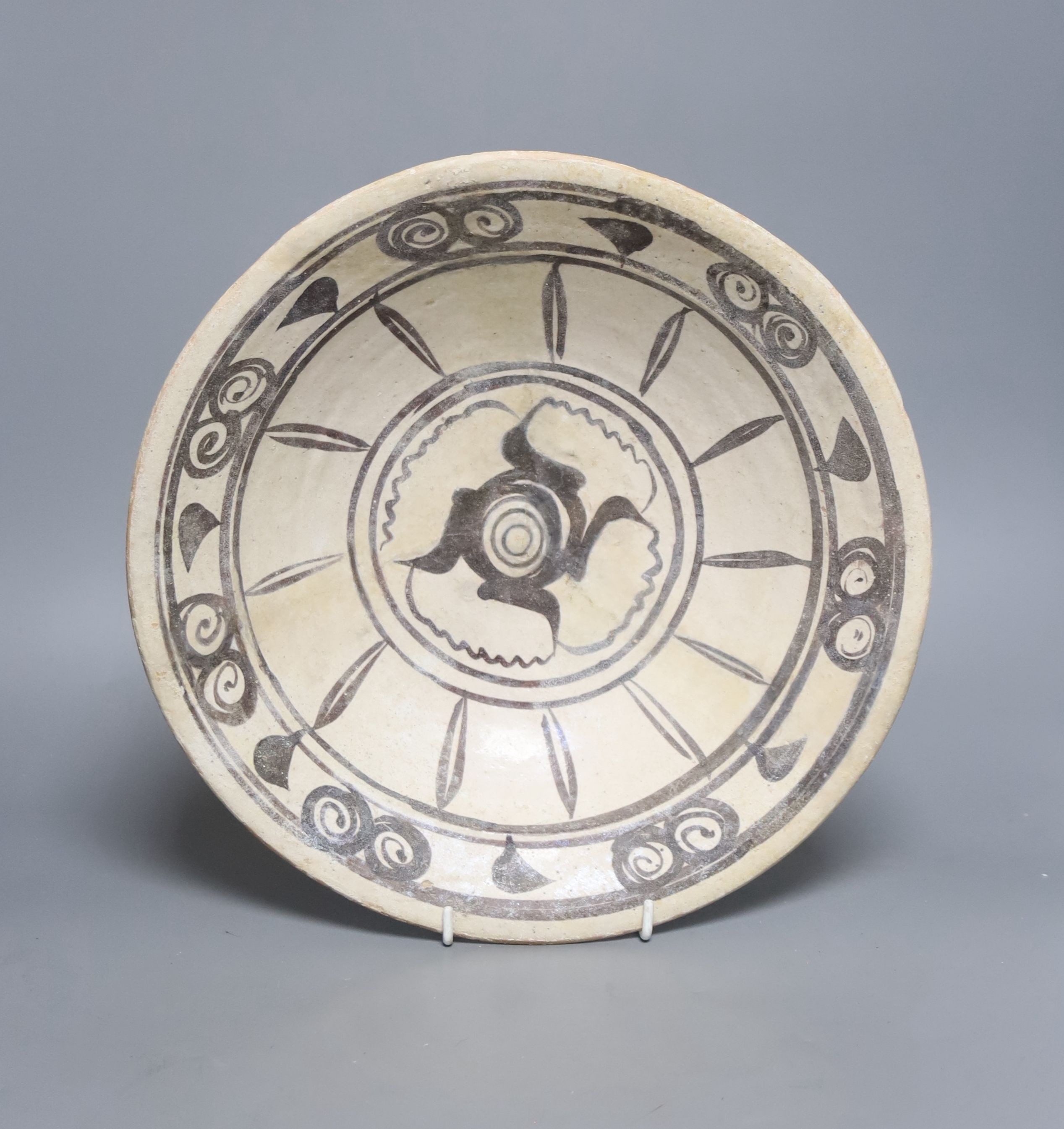 A Persian shallow bowl, medieval, diameter 30cm